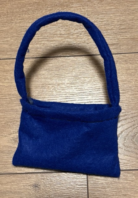 I sew a tiny purse made out of felt. 