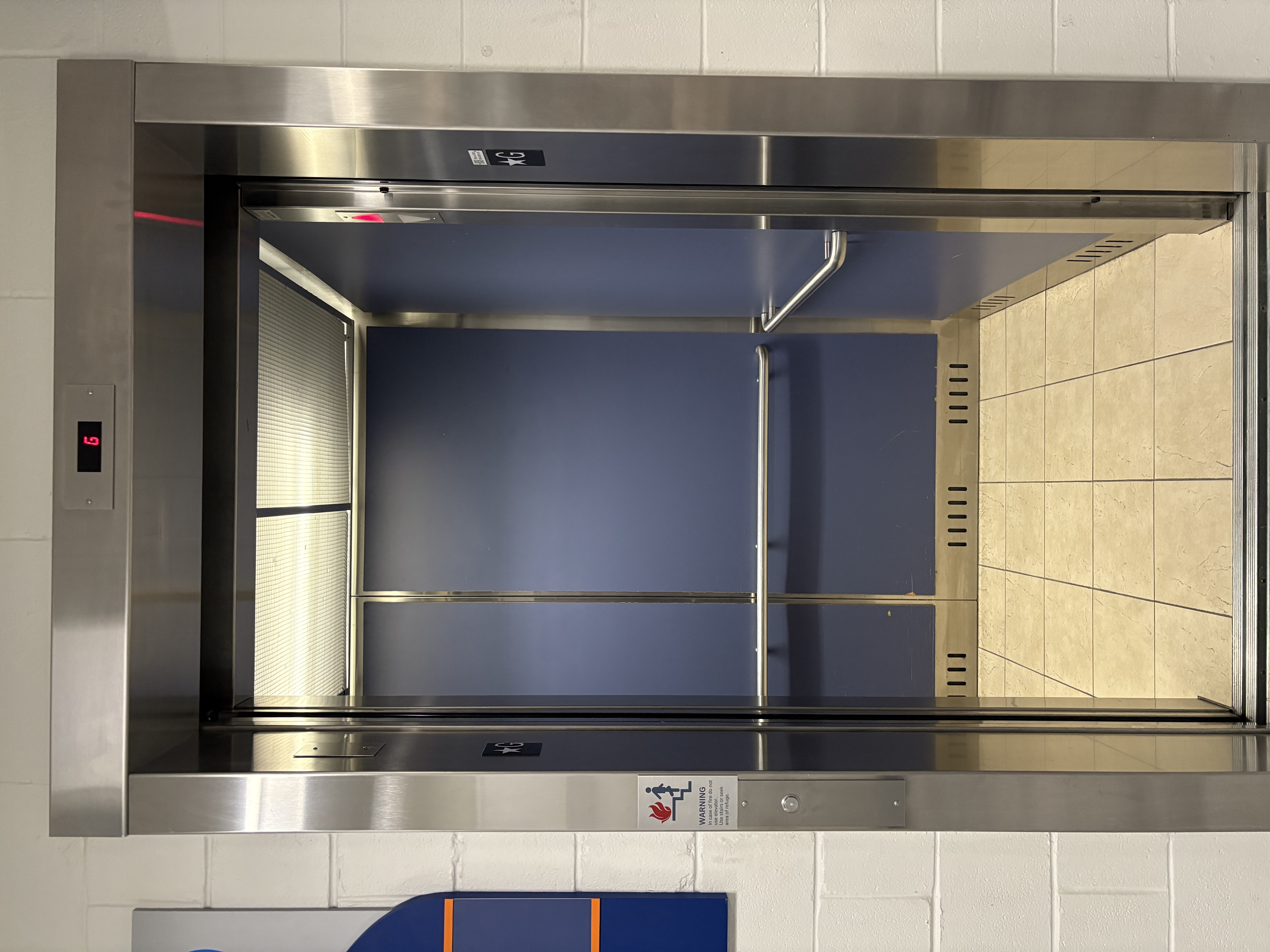 Elevator in the A-wing next to the photography hallway. It is used to provide an accessibility route to upper floors, where upper year animation students have classes.